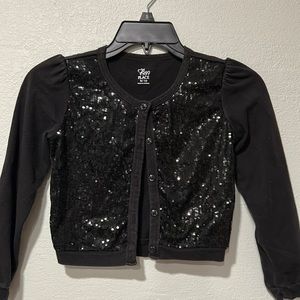 Girls, black, shrug/sweater. Place. Size medium 7–8. excellent condition